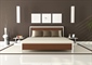 A bedroom is a private room where people usually sleep for the...