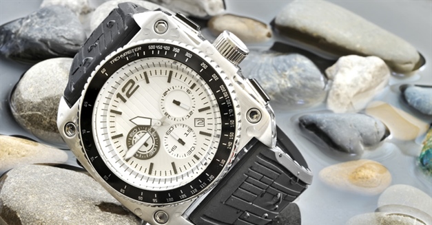 A watch is a small timepiece, typically worn either on the wrist or attached on a chain and carried in a pocket, with wristwatches being the most common type of watch used today