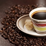 Coffee is a brewed beverage with a dark, acidic flavor prepared from the roasted seeds of the...