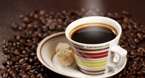 Coffee is a brewed beverage with a dark, acidic flavor prepared from the roasted seeds of the coffee plant, colloquially called coffee beans