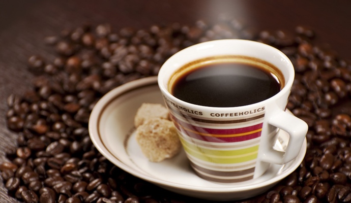 Coffee is a brewed beverage with a dark, acidic flavor prepared from the roasted seeds of the coffee plant, colloquially called coffee beans