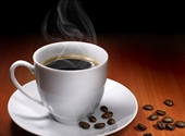 Coffee is a brewed beverage with a dark, acidic flavor prepared from the roasted seeds of the coffee plant, colloquially called coffee beans