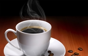 Coffee is a brewed beverage with a dark, acidic flavor prepared from the roasted seeds of the coffee plant, colloquially called coffee beans