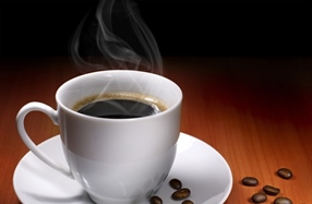 Coffee is a brewed beverage with a dark, acidic flavor prepared from the roasted seeds of the coffee plant, colloquially called coffee beans