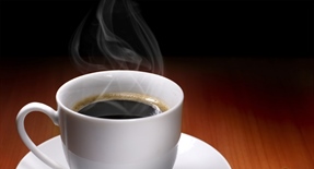 Coffee is a brewed beverage with a dark, acidic flavor prepared from the roasted seeds of the coffee plant, colloquially called coffee beans