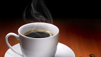 Coffee is a brewed beverage with a dark, acidic flavor prepared from the roasted seeds of the...