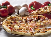 Pizza is an oven-baked, flat, disc-shaped bread typically topped with a tomato sauce, cheese and various toppings.