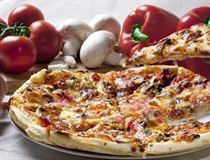 Pizza is an oven-baked, flat, disc-shaped bread typically topped with a tomato sauce, cheese and various toppings.
