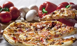 Pizza is an oven-baked, flat, disc-shaped bread typically topped with a tomato sauce, cheese and various toppings.