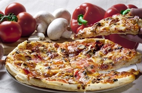 Pizza is an oven-baked, flat, disc-shaped bread typically topped with a tomato sauce, cheese and various toppings.