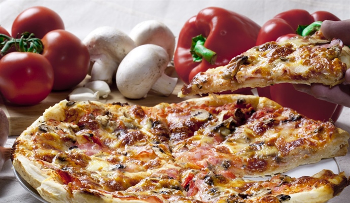 Pizza is an oven-baked, flat, disc-shaped bread typically topped with a tomato sauce, cheese and various toppings.