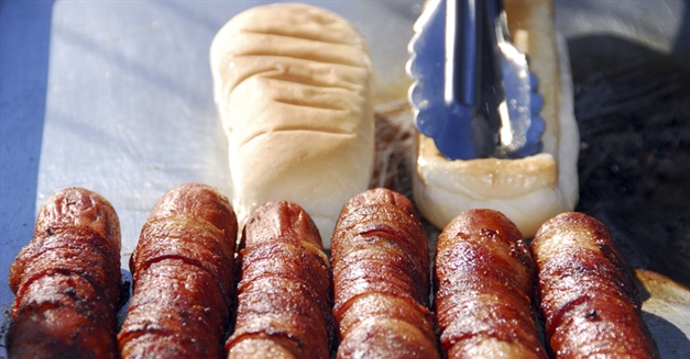 A hot dog is a sausage served in a sliced bun