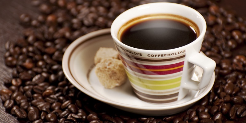 Coffee is a brewed beverage with a dark, acidic flavor prepared from the roasted seeds of...