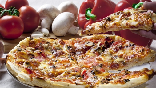 Pizza is an oven-baked, flat, disc-shaped bread typically topped with a tomato sauce, cheese and various toppings.