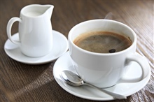 Coffee is a brewed beverage with a dark, acidic...